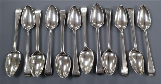 Twelve assorted early 19th century and later silver Old English thread pattern dessert spoons, 15 oz.